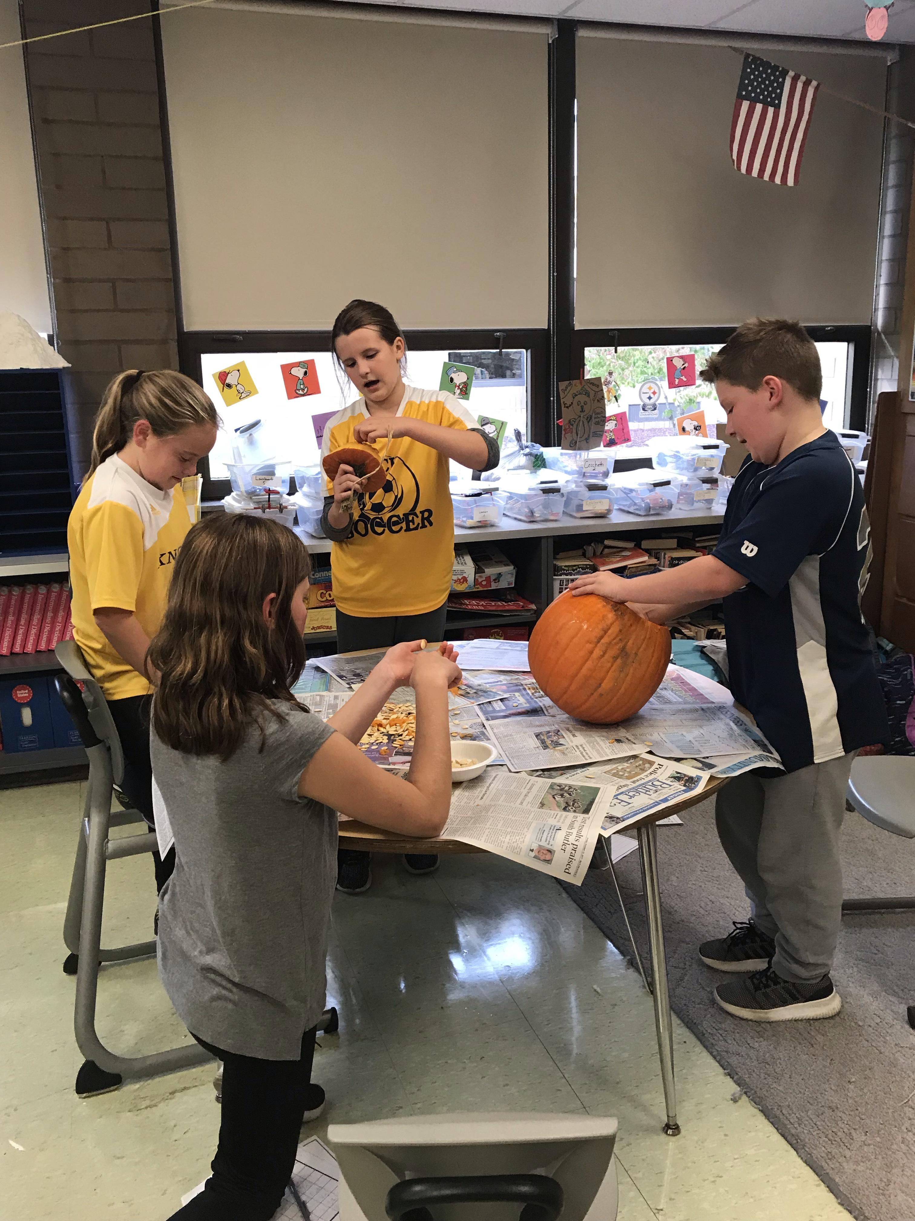 students doing pumpkin math